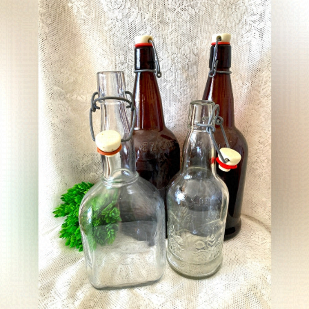 3 EZ Cap Glass Brewing Beer Bottle and 1 Unknown. All in great shape.Total of 4